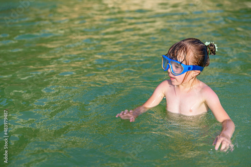 Six-year-old Caucasian girl enjoys a vacation at sea. Summer vacation. Sea. Happy childhood