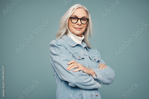Empowered mature woman looking at the camera confidently photo