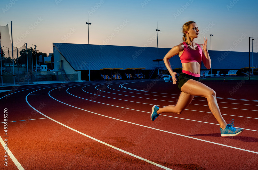 Fototapeta premium Runner sprinting towards success on run path running athletic track. Goal achievement concept.