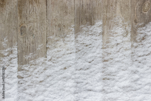 Beautiful wood planks backdrop. Wooden boards under the snow.