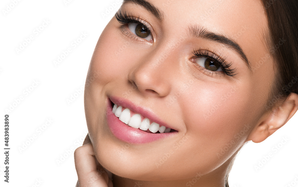 Fototapeta premium Beauty woman face portrait. Girl with perfect skin. Brunette female. Isolated on white.