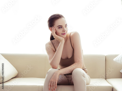 Woman home portrait sofa relax female indoors portrait