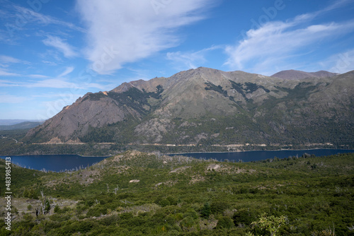View of the forest, blue water Gutierrez lake and Catedral hill in Bariloche, Patagonia Argentina.  photo