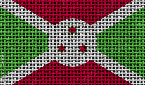 Burundi flag on the surface of a metal lattice. 3D image