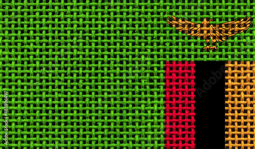 Zambia flag on the surface of a metal lattice. 3D image