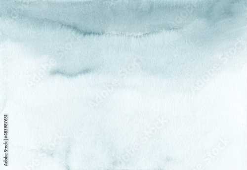 Watercolor ombre pastel grey background texture, hand painted. Aquarelle gradient light gray-blue backdrop, stains on paper. Artistic smoke color painting wallpaper.