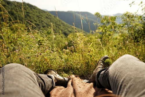 Leather boots and view from a small mountain