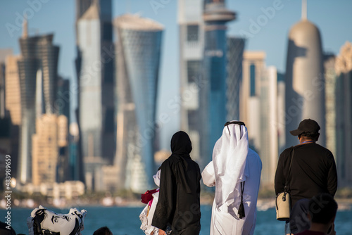 Doha, Qatar - December 18, 2017 : The Qatari family is watching the national day celebration.
