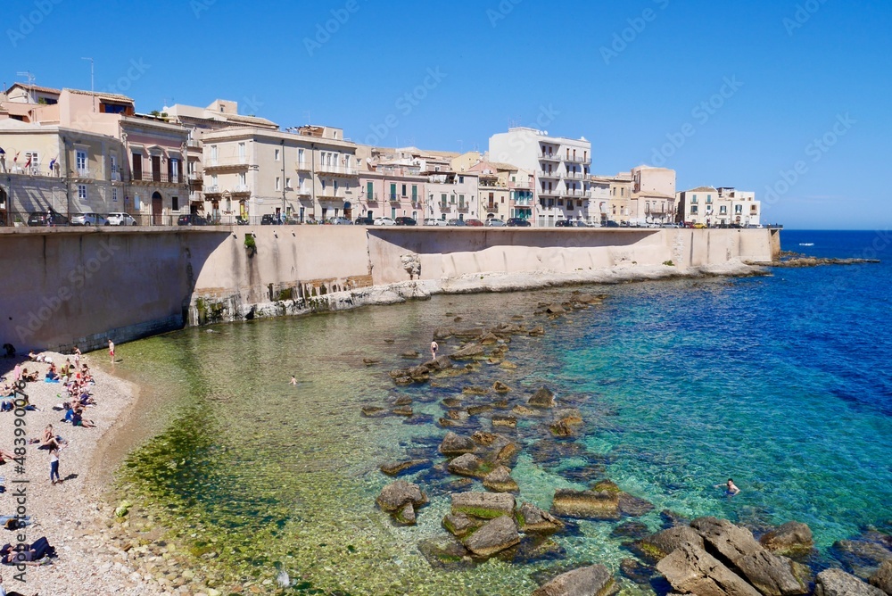 Panoramic view of beach and coast of Ortigia island in Syracuse on a sunny day. Sicily, Italy.