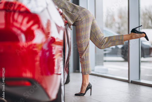 Business woman bying a car