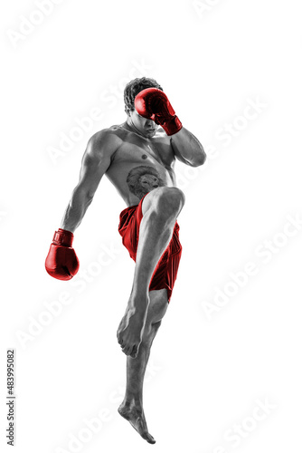 Full size of professional kickboxer in red gloves on white background. Black and white silhouette © zamuruev