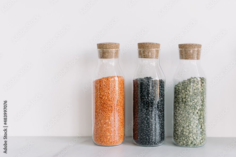 Bottles with cereals in modern trendy kitchen Bottles with cereals in modern trendy kitchen