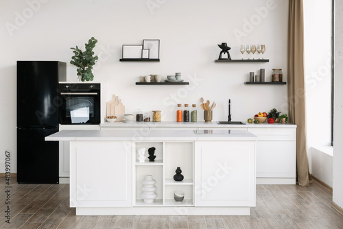Nordic kitchen interior design in white tones with bar