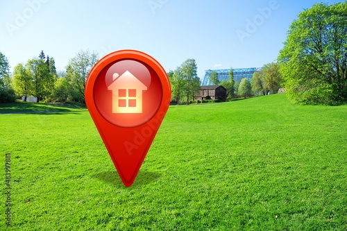 House symbol with location pin icon on earth in real estate sale or property investment concept, photo