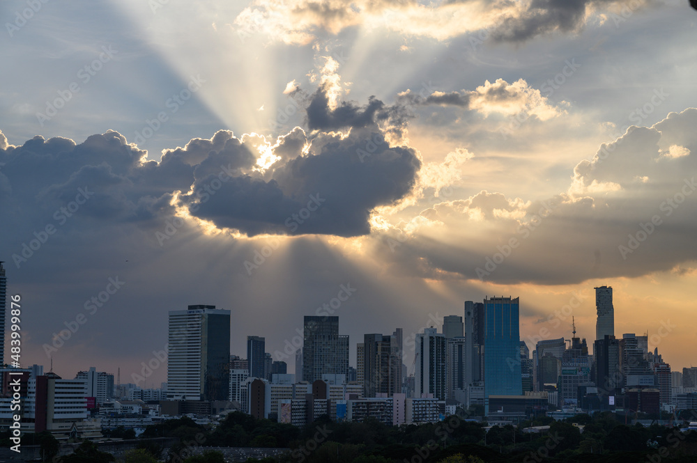 Fototapeta premium Sunset over city with explody cloud