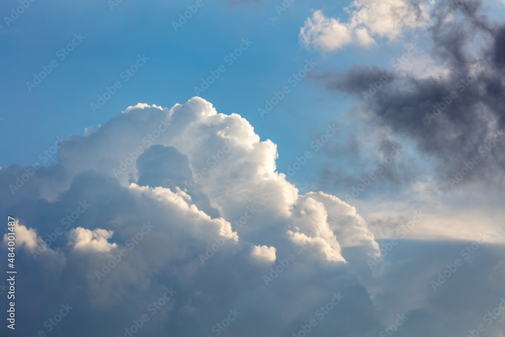 Cloud on blue sky background. White and grey color cloudscape, gloomy weather Cloud on blue sky background. White and grey color cloudscape, gloomy weather