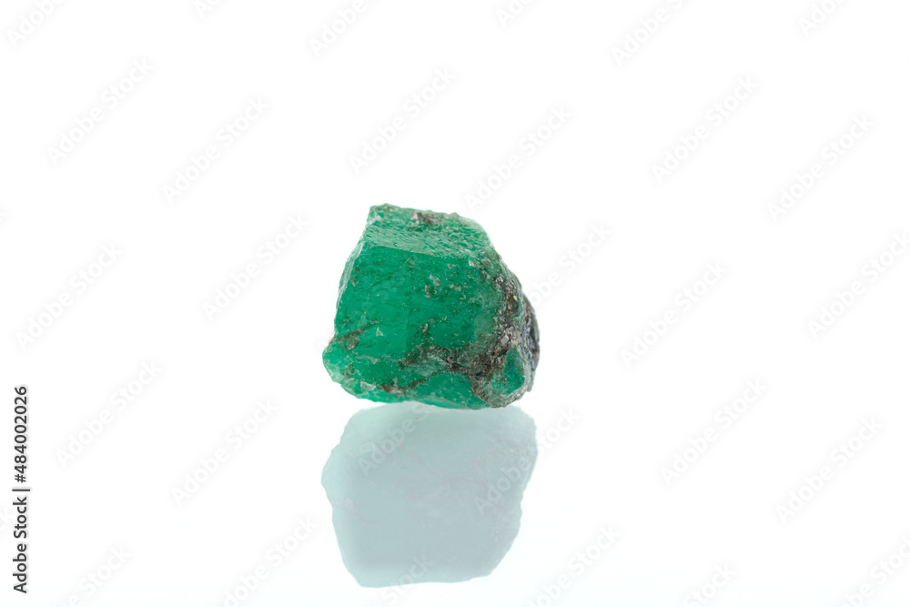 macro mineral stone emerald on a white background macro mineral stone emerald on a white background