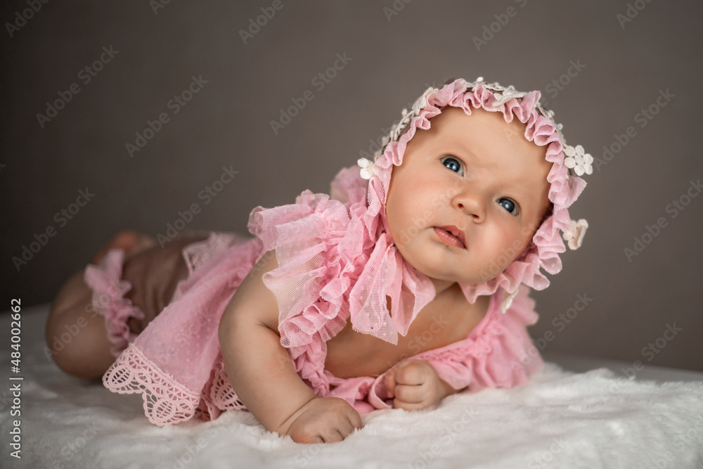 cute newborn baby girl in retro dress and cap cute newborn baby girl in retro dress and cap