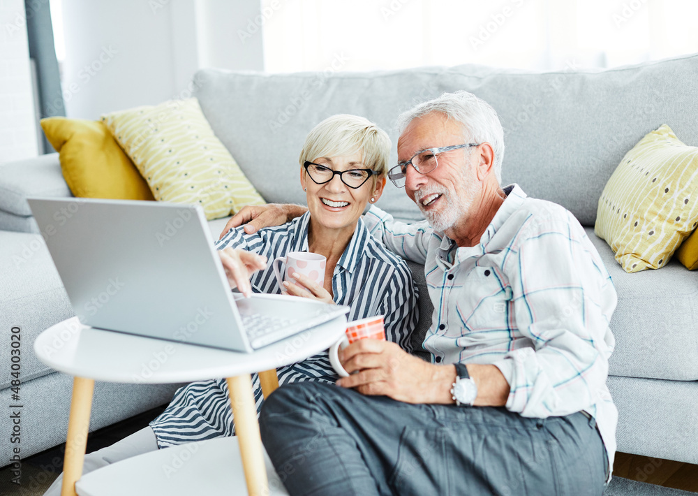 senior couple happy laptop computer love together elderly love man woman shopping online internet