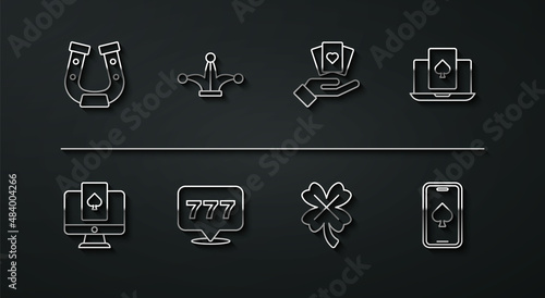 Set line Horseshoe, Online poker table game, Casino slot machine with clover, Slot jackpot, Joker playing card, and Hand holding cards icon. Vector