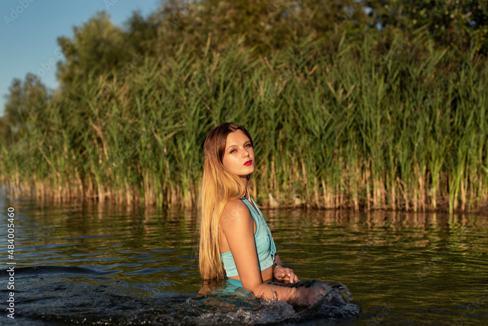 Fototapeta premium Young blonde girl on vacation