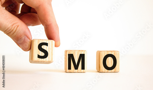 SMO, social media optimization symbol. Concept word SMO - social media optimization on wooden cubes on beautiful white background, copy space. Business, SMO - social media optimization concept.