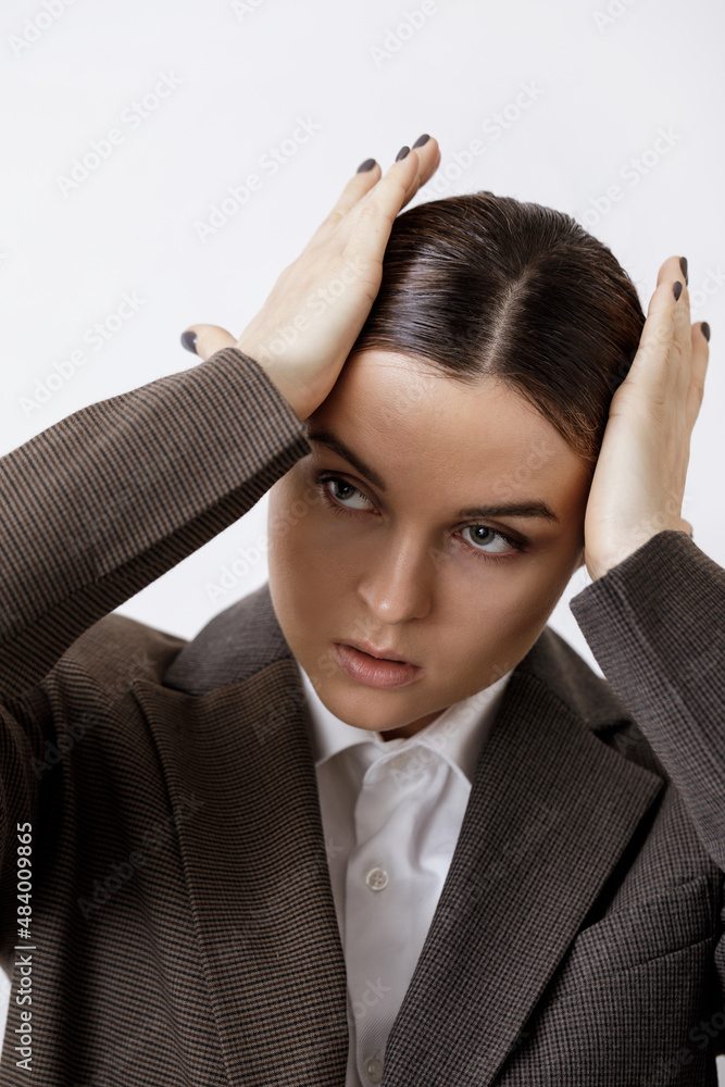 Fashionable studio portrait of young masculine woman Fashionable studio portrait of young masculine woman
