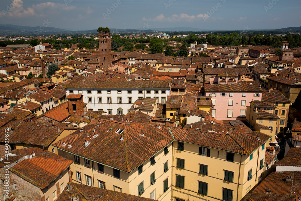 Rooftops of ancient, picturesque buildings in Lucca, Italy
