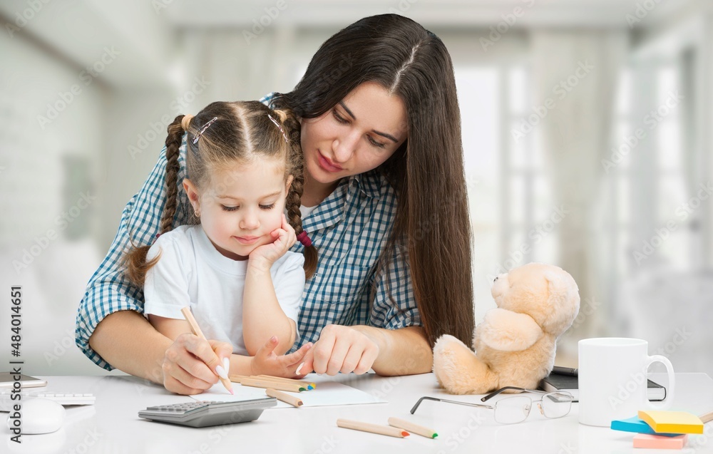 Working young mother it home with little spoiled child Working young mother it home with little spoiled child