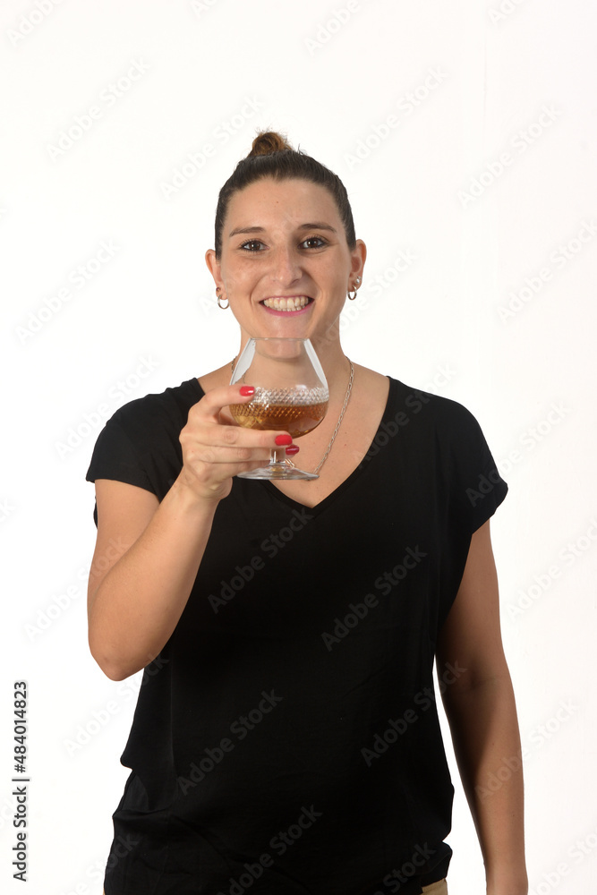 woman holdign a cup of alcohol on white background woman holdign a cup of alcohol on white background