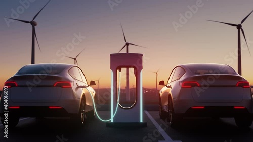 Charging station in sunset light. Charging process. Parking with electric cars. Green energy recovery concept.