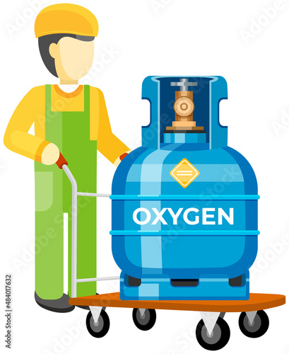 Male worker transporting gas cylinder, canister with oxygen on warehouse trolley. Metal tank with liquefied compressed oxygen. Pressurized gas cylinder, storage with tap for substance release