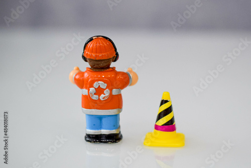 a road worker or a worker with a jackhammer in various situations on the road, dolls 
