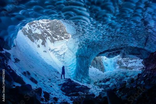 Man inside an ice cave