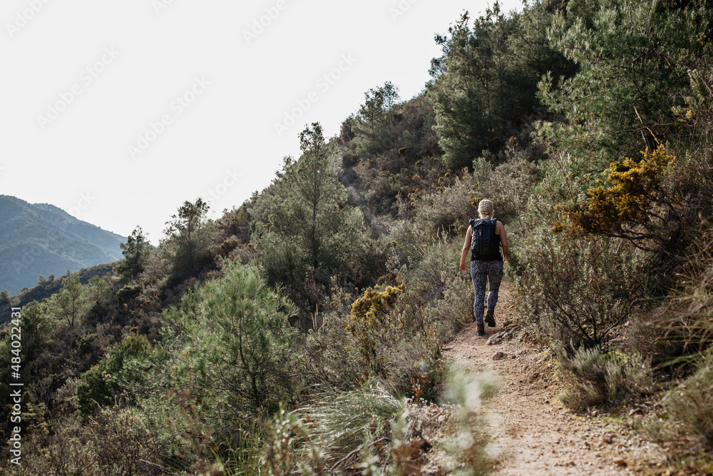 woman hiking in spain at the spanish mountains outdoors