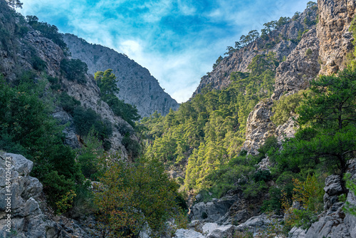 autumn mountain landscape with shady lake