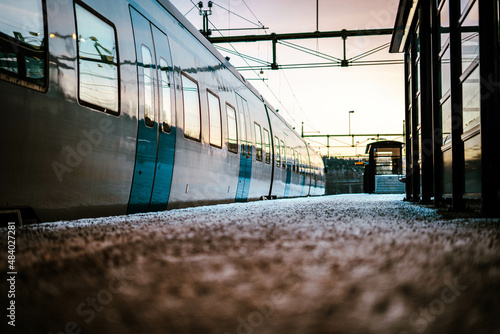 Train about to take of in Stockholm in the evening