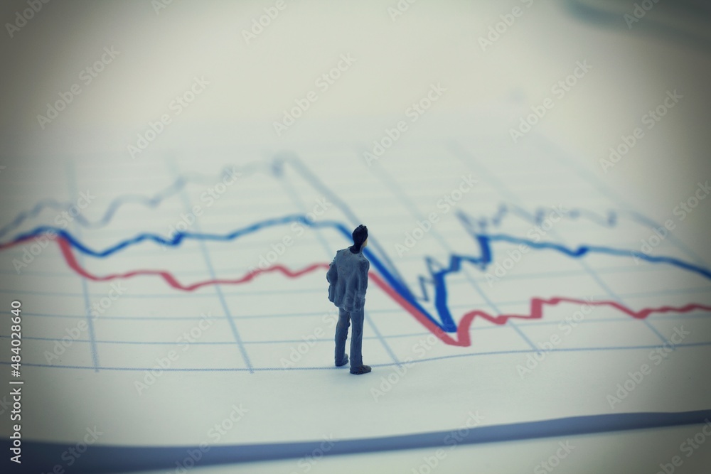 Man watching a stock graph. Concept of economics. Man watching a stock graph. Concept of economics.