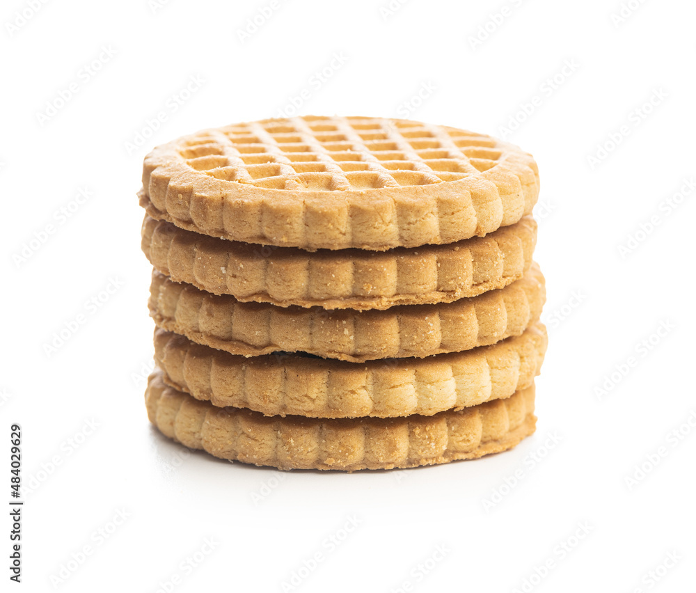 Stacked butter biscuits. Sweet cookies isolated on white background. Stacked butter biscuits. Sweet cookies isolated on white background.