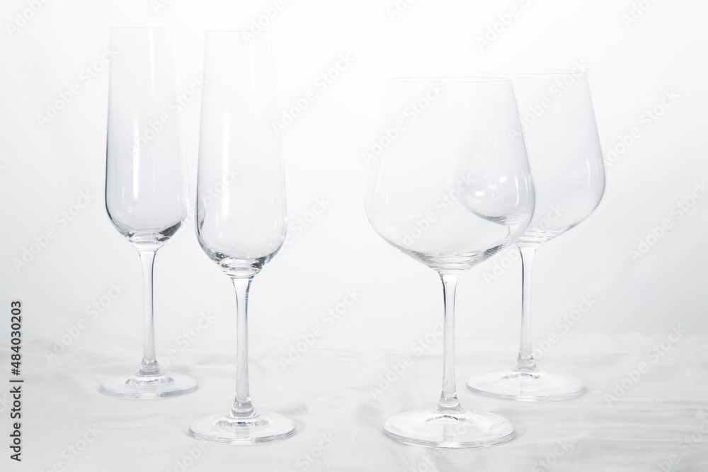Wine and champagne glasses on a white background. Wine and champagne glasses on a white background.