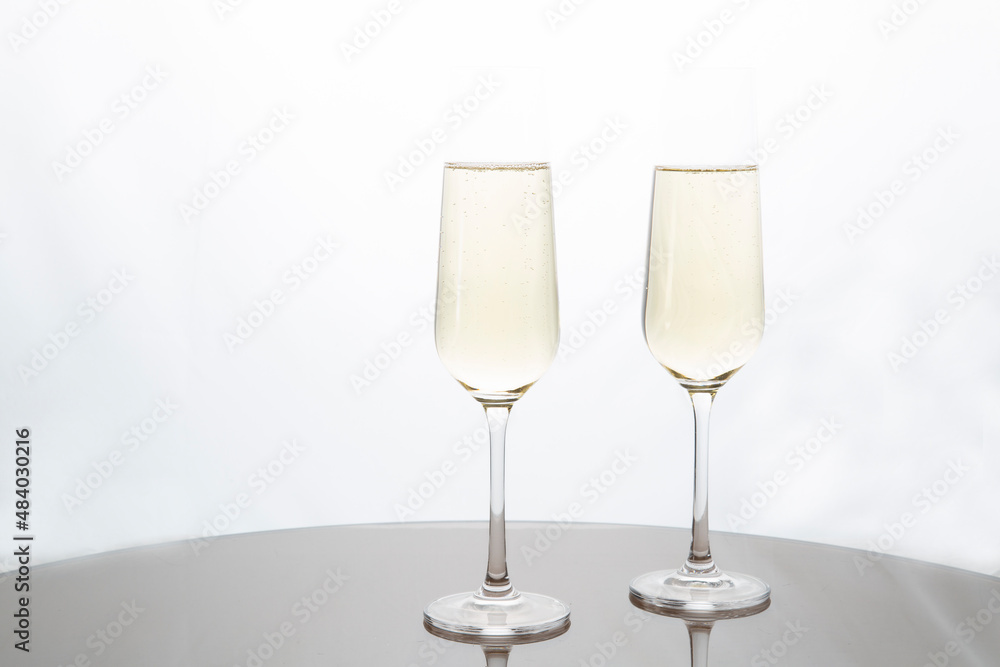 Champagne glasses on a white background.Alcoholic beverages. Champagne glasses on a white background.Alcoholic beverages.