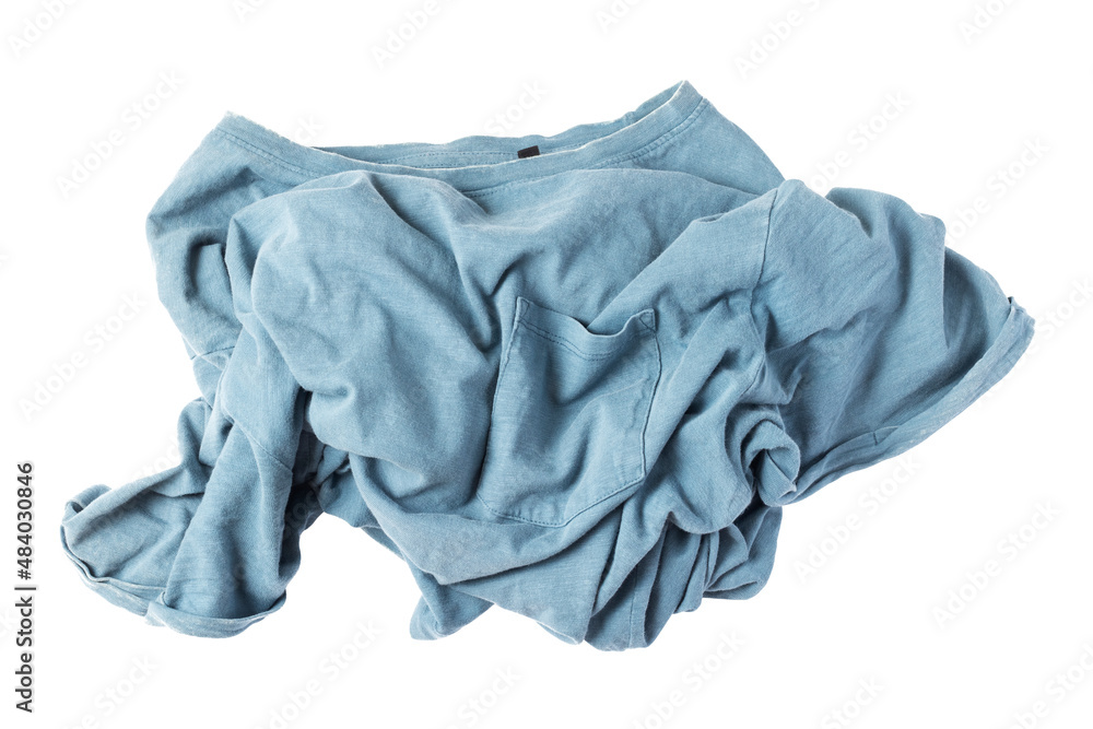 Crumpled blue t-shirt isolated on white background.