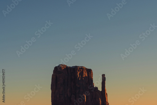 Monument valley in the state of Utah, United States. Navajo Indian Reservation. Wild West. Travel and vacation concept. Reddish desert.