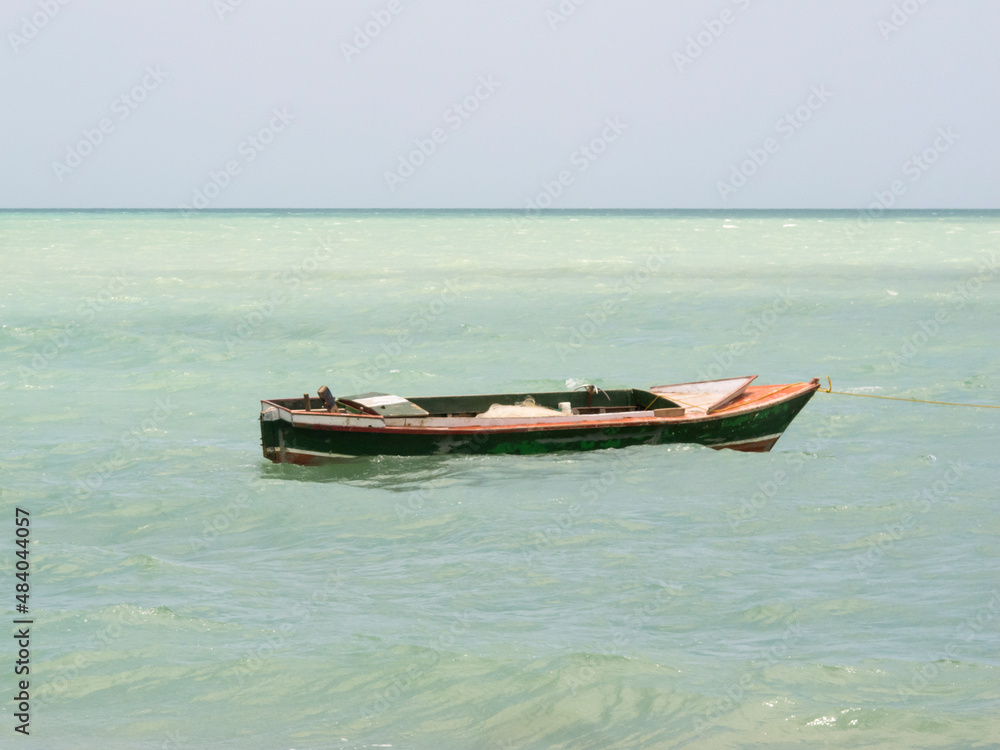 Boat on the crystal blue sea. Guajira, Colombia. 