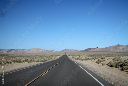 Endless road in the middle of the Death Valley Desert