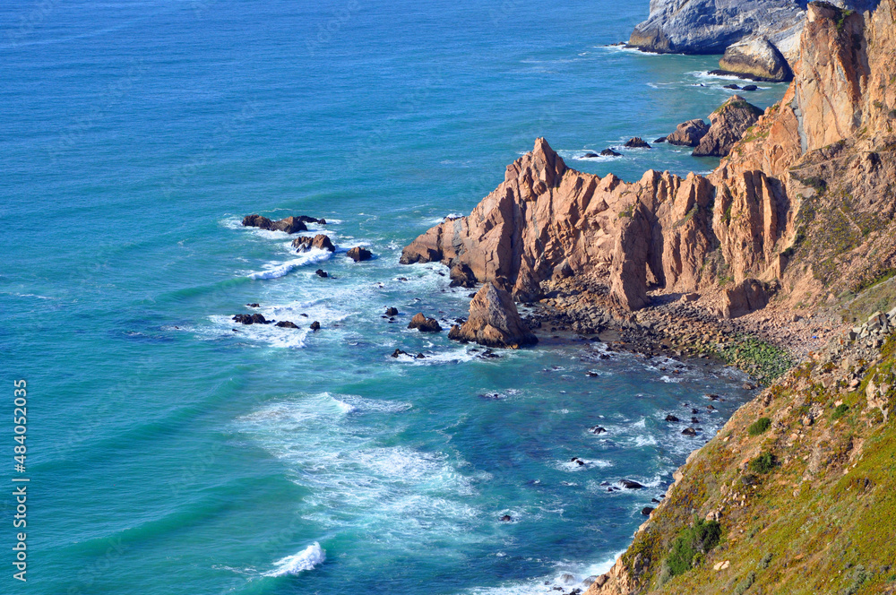 Rocky cliff at Cabo da Roca which is the most westerly point of the Europe mainland in town of Sintra, Lisbon District, Portugal.
