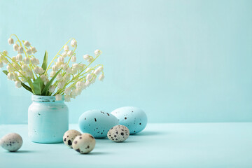 colorful easter eggs and spring flowers