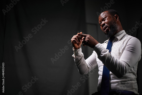 Deaf man speaking with sign language in a studio