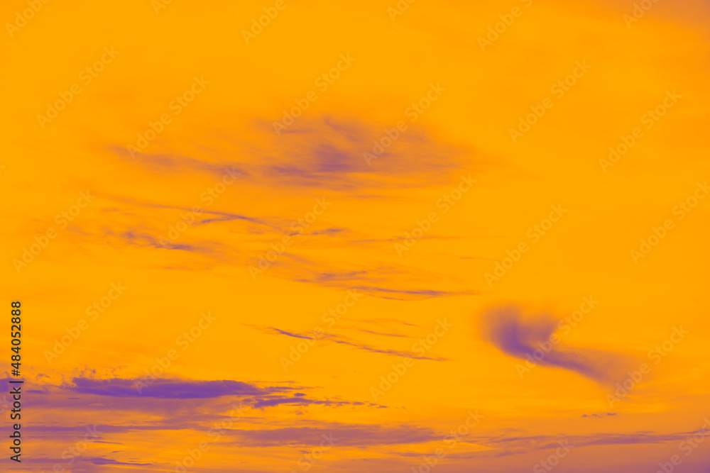 Yellow sky with blue clouds . Abstract colored heaven