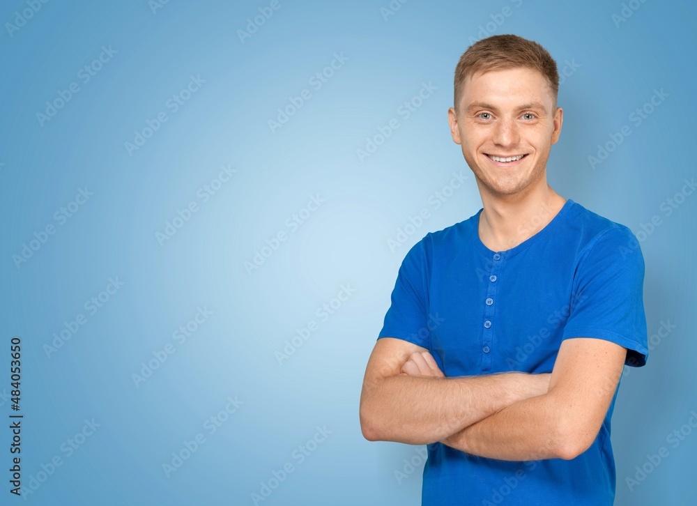Portrait of attractive glad cheerful man demonstrating ad copy space Portrait of attractive glad cheerful man demonstrating ad copy space